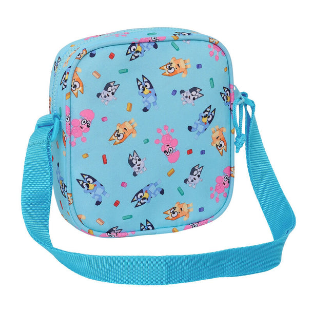 Détail de la sangle ajustable du sac Bluey SAFTA en tissu résistant bleu