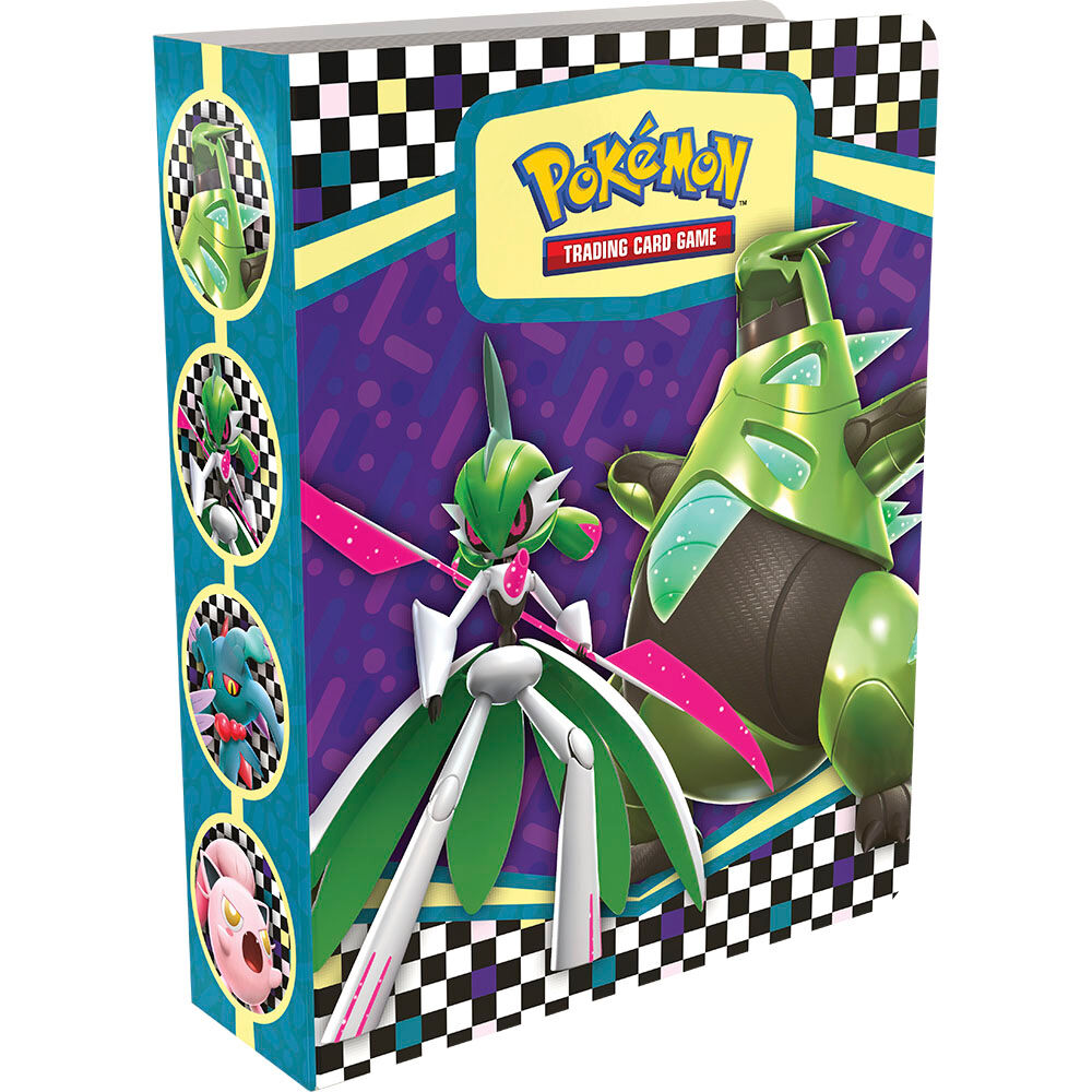 Coffret collector Pokémon posé sur une table avec éclairage mettant en valeur les couleurs