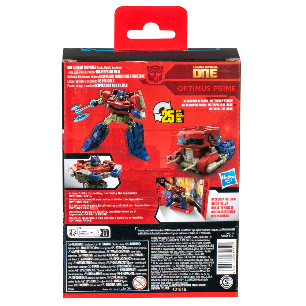 Figurine Optimus Prime Deluxe Class posée sur un fond neutre montrant ses articulations