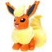 Peluche Flareon Pokémon vue de face avec ses détails orange et jaune vif