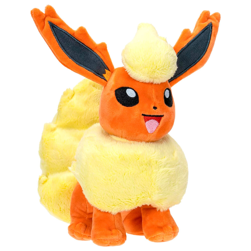 Peluche Flareon Pokémon posée sur un fond neutre mettant en valeur sa texture douce