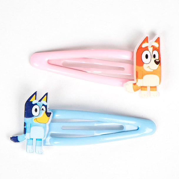 Lunettes de soleil bleues du set beauté Bluey CERDÁ posées à côté des accessoires