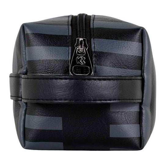 Compartiment zippé intérieur avec doublure protectrice pour ranger vos accessoires de beauté.
