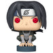 Vue rapprochée de la figurine Funko POP Itachi Uchiha avec détails précis du visage et du costume de Naruto Shippuden.