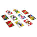 Enfants jouant au jeu de cartes UNO Super Mario Bros, concentrés et s'amusant en famille.