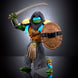 Vue d'ensemble des quatre figurines Masters of the Universe Turtles of Grayskull sur fond blanc