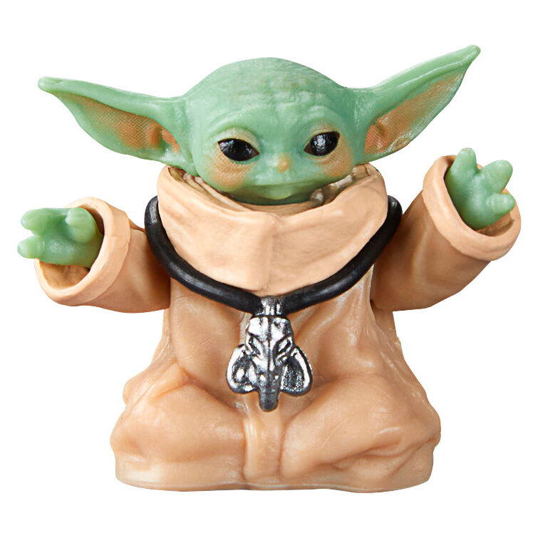 Comparaison de la figurine Grogu avec une autre figurine Star Wars pour montrer l'échelle