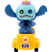 Vue latérale de la figurine Stitch assortie mettant en valeur ses pattes et posture dynamique