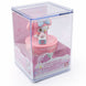 Figurine Hello Kitty posée à côté de la boîte capsule surprise YUME TOYS