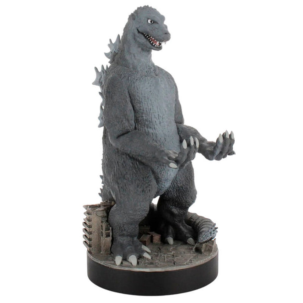 Support Godzilla City Destroyer tenant une manette PlayStation 5 DualSense en charge