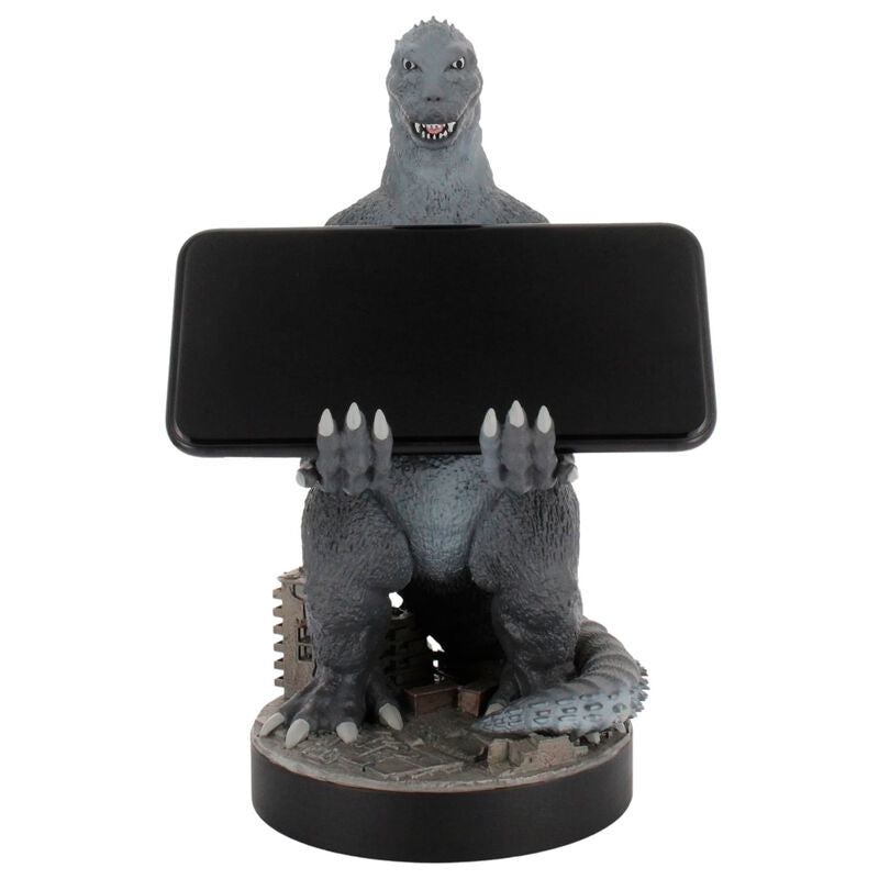 Support Godzilla City Destroyer avec manette et smartphone alignés sur un bureau de gamer