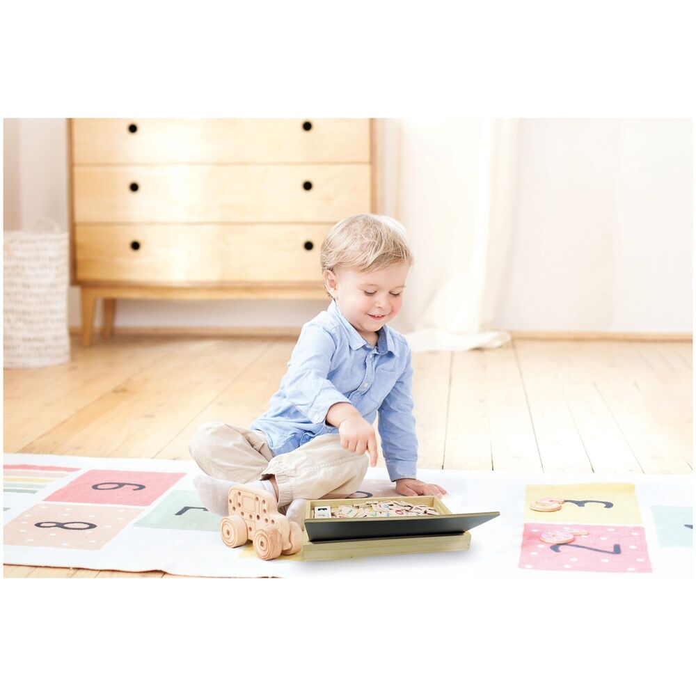 Logo de la marque LEXIBOOK sur le packaging du jeu éducatif bilingue