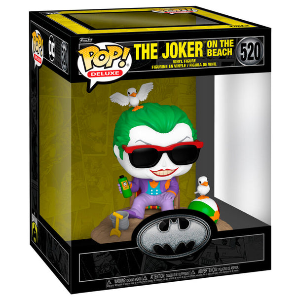 Figurine POP Deluxe du Joker en tenue de plage avec accessoires colorés et expression malicieuse, vue de face.