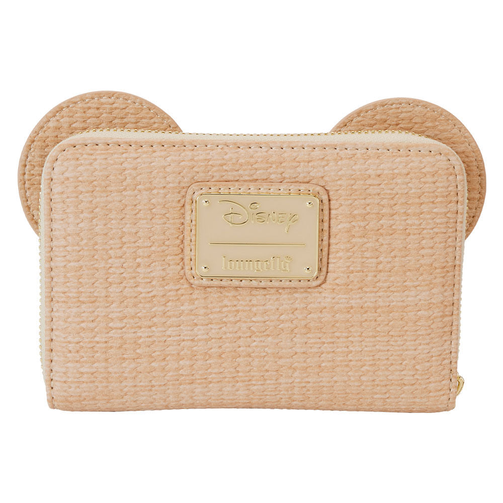 Zoom sur les détails appliqués Mickey Mouse en cuir vegan sur le portefeuille Loungefly.