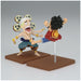 Vue latérale de la figurine Enel avec ses accessoires et posture caractéristique