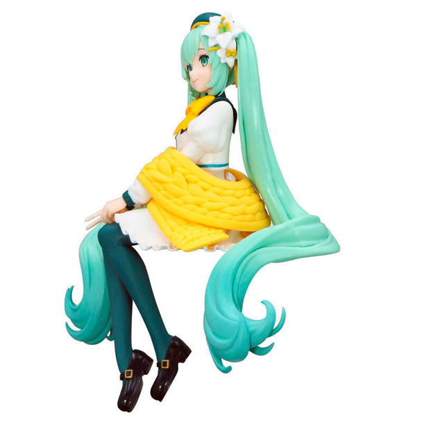 Profil latéral de la figurine Hatsune Miku Flower Fairy Lily White montrant la pose et les accessoires