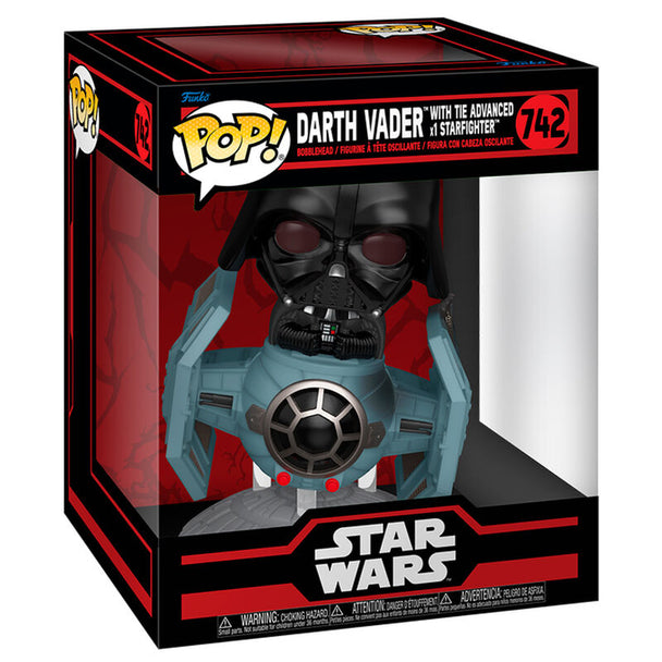 Figurine POP Deluxe de Darth Vader en position emblématique avec son casque noir brillant et sa cape, édition FUNKO Star Wars.