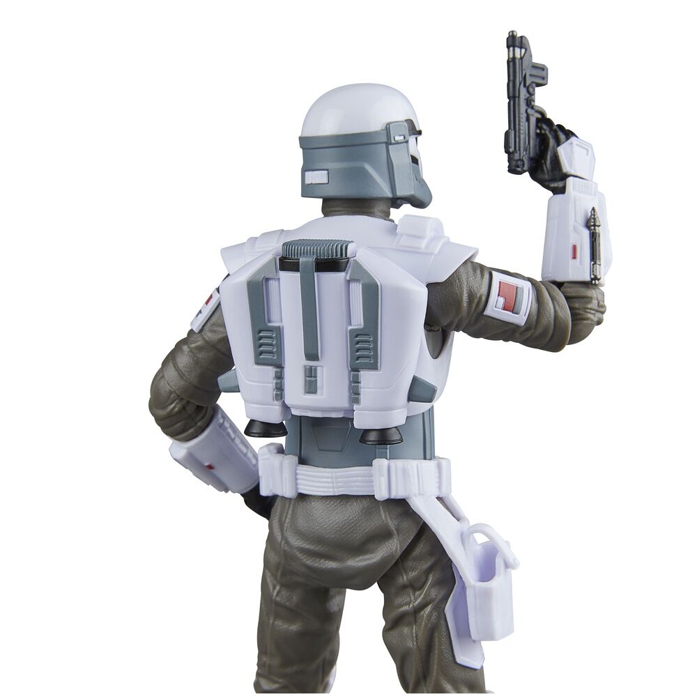 Figurine articulée en position d'action avec jetpack détaché à côté