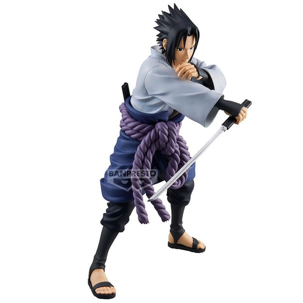 Vue rapprochée du visage de Sasuke montrant le détail du Mangekyo Sharingan sur la figurine