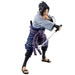 Vue rapprochée du visage de Sasuke montrant le détail du Mangekyo Sharingan sur la figurine