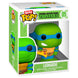 Image du Turtle Van vert emblématique avec les logos TMNT visibles
