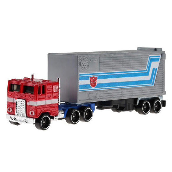 Camion transporteur Hot Wheels assorti en métal à l'échelle 1:64 avec remorque détachable sur fond blanc
