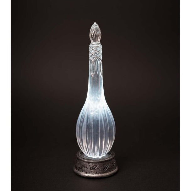 Détail du design de la lampe Earendil montrant la texture de la résine et l’éclairage LED froid