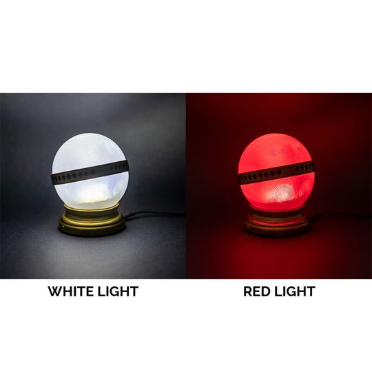 Détail du bouton tactile de la lampe Remembrall Harry Potter avec indication des modes lumineux