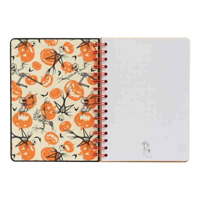 Fermeture élastique noire entourant le cahier A5 Disney pour maintenir les pages bien fermées