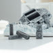 Angle latéral du calendrier perpétuel Star Wars AT-AT montrant les détails sculptés