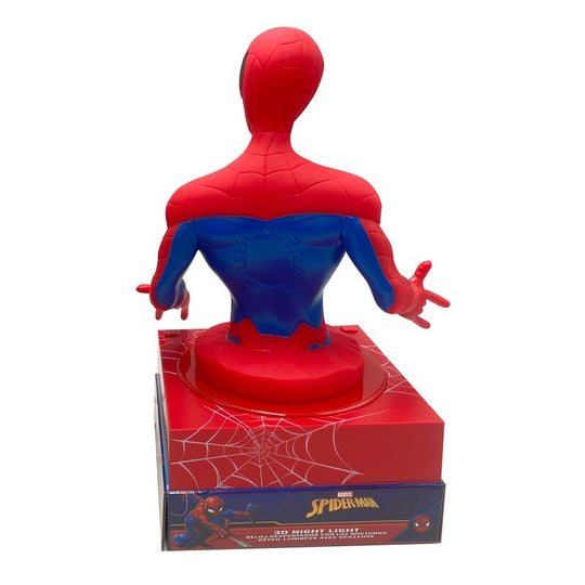 Lampe 3D Spiderman Marvel posée sur une table de chevet à côté d'un livre pour enfant