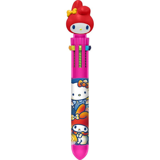 Topper 3D Hello Kitty fixé sur un stylo rose avec décorations enfantines en arrière-plan