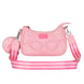 Sac Barbie KARACTERMANIA porté à l'épaule, illustrant la bandoulière confortable et réglable