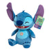 Peluche Stitch JUST PLAY en position assise, montrant ses mouvements et sons activés