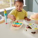 Flûte en bois du kit musical FISHER-PRICE, conçue pour les petites mains des enfants