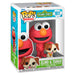 Figurine Funko POP Sesame Street Elmo tenant Tango, en vinyl de 9 cm dans sa boîte cadeau colorée