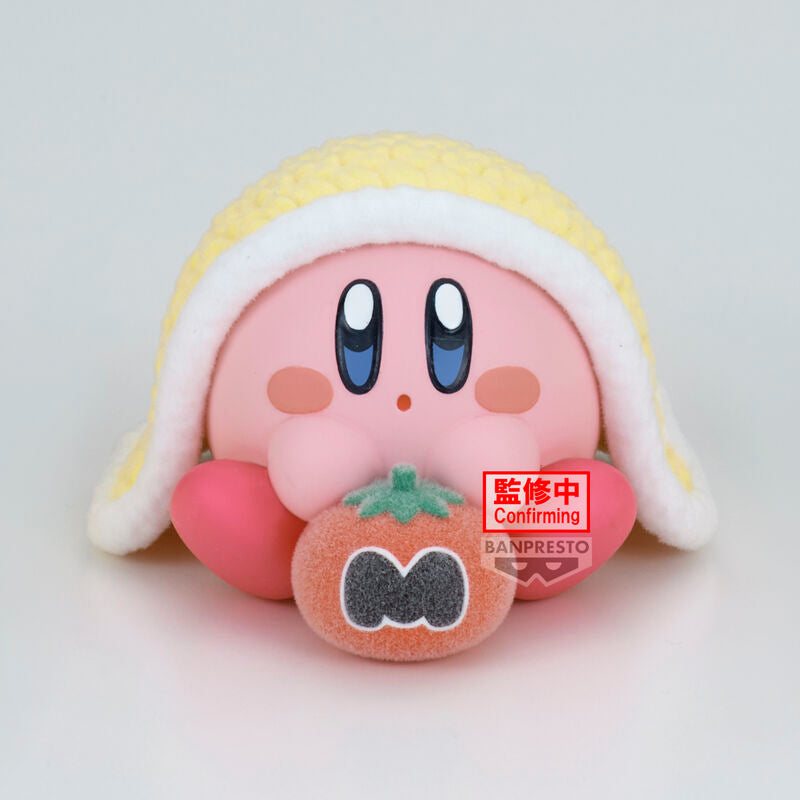 Gros plan sur le visage souriant de la figurine Kirby ver. B Break Time de BANPRESTO