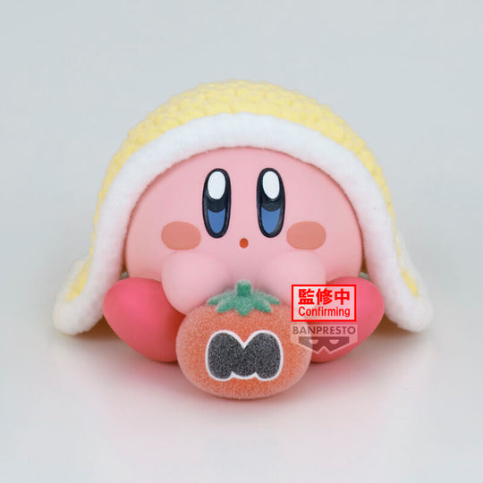 Gros plan sur le visage souriant de la figurine Kirby ver. B Break Time de BANPRESTO