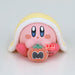 Gros plan sur le visage souriant de la figurine Kirby ver. B Break Time de BANPRESTO