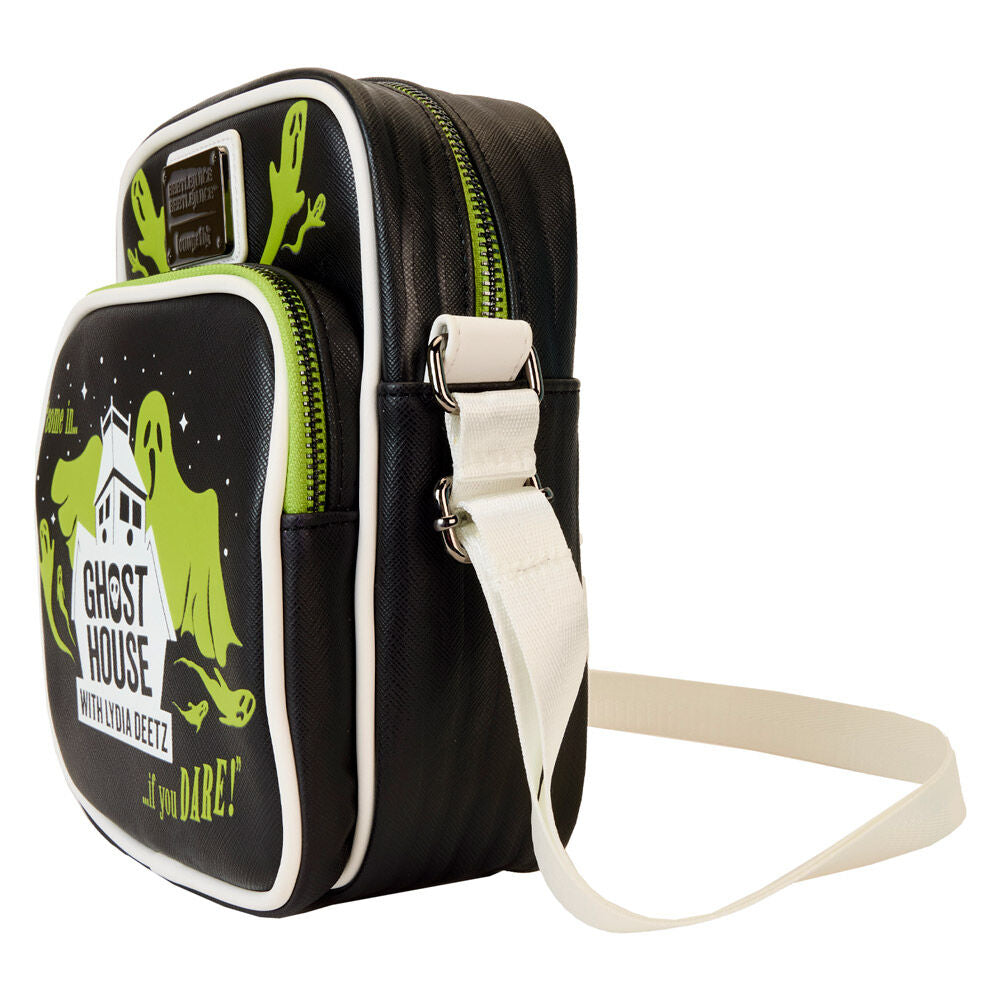 Vue latérale montrant la poche avant zippée et les finitions bronze du sac Loungefly Beetlejuice