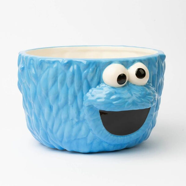 Vue latérale du bol Cookie Monster montrant le design 3D et les détails colorés