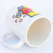 Gros plan sur le motif Tata imprimé sur le mug en céramique de 330ml