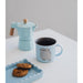 Zoom sur le motif Pusheen et l’inscription Purrfect Love sur le mug en céramique