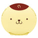 Capsule surprise avec personnage Sanrio Monkichi, jaune et marron