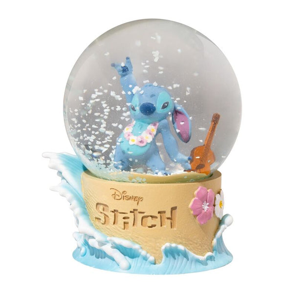 Boule à neige Disney Stitch vue de face avec sphère de cristal et particules en suspension