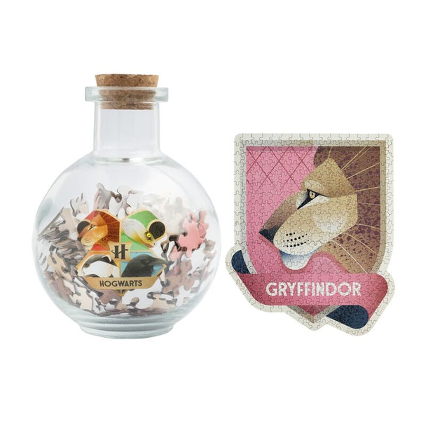 Puzzle Harry Potter Gryffindor de 322 pièces présenté dans une bouteille en verre avec bouchon en liège