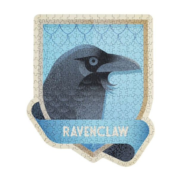 Bouteille en verre en forme de potion contenant le puzzle Ravenclaw, avec un bouchon en liège visible sur le dessus.