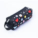 Photo intérieure montrant l'espace et les compartiments pour stylos et accessoires dans la trousse BT21 Cool ERIK