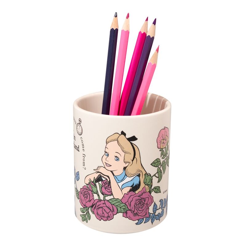 Porte-crayons Disney Alice au Pays des Merveilles rempli de crayons et stylos sur un bureau en bois