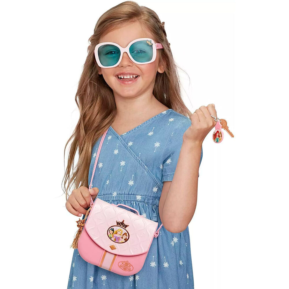 Lunettes de soleil stylées incluses dans le set sac à main Disney Princess World Traveler